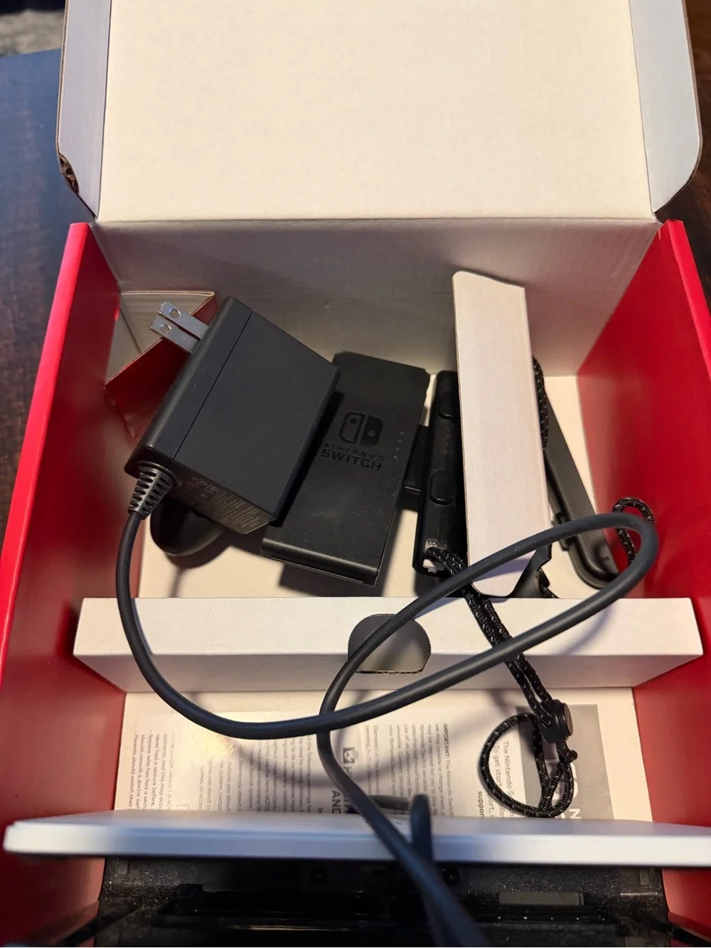 Nintendo Switch OLED Console Bundle in White with Black Case and Two Games